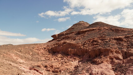 Fototapeta na wymiar Rock and red terrain, in the national geological Timna park, Israel