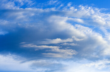 Naklejka na ściany i meble White clouds in blue sky