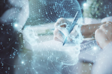 Fototapeta premium Multi exposure of writing hand on background with brain hologram. Concept of self learning.