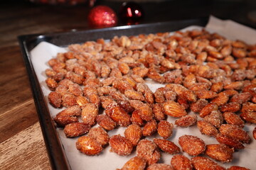 Almonds roasted with sugar and cinnamon fill the house with a festive atmosphere.