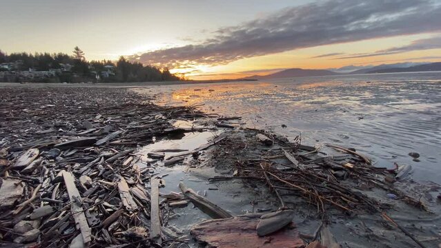 sunset at panish Banks beach Vancouver Canada, colourful sky and ocean water seascape travel destination 