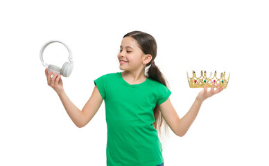 Privilege of premium music account. Little girl listen music modern headphones. Small kid listen...