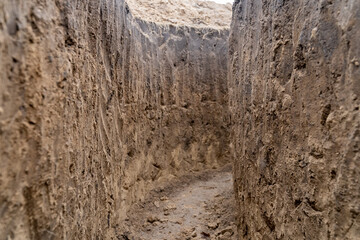 war in Ukraine Digging trenches on the contact line Freshly excavated protective army engineering...
