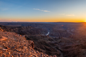 Fototapeta na wymiar Wide angle landscape shot of the fish river canyon in Southern Namibia, around sunset.