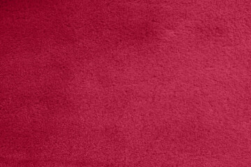 Viva magenta color of the year 2023, fur texture. Fabric artificial fur .