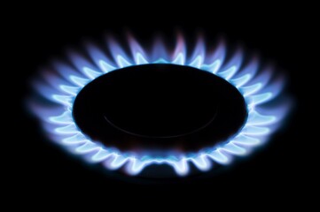 Gas burner, kitchen stove cooking flame close up shot
