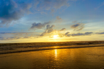 Seascape - sunset on the beach, waves, horizon. Top view. landscape. Parangtritis Beach, Yogyakarta