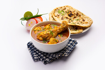 Red Chicken Curry or murgh Masala or korma with prominent Leg Piece