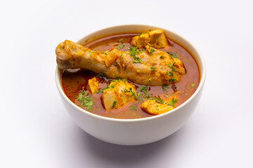 Red Chicken Curry or murgh Masala or korma with prominent Leg Piece
