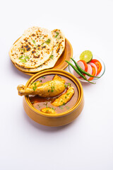Red Chicken Curry or murgh Masala or korma with prominent Leg Piece