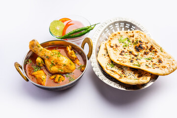 Red Chicken Curry or murgh Masala or korma with prominent Leg Piece