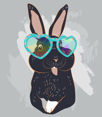 A black rabbit with glasses is teasing. Print on next year's T-shirt. - 554001820