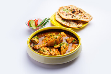 Red Chicken Curry or murgh Masala or korma with prominent Leg Piece
