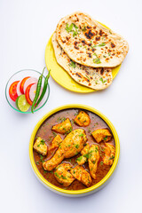 Red Chicken Curry or murgh Masala or korma with prominent Leg Piece