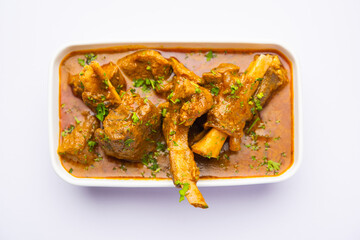 Indian style Mutton OR Gosht Masala OR indian lamb meat rogan josh served with Naan