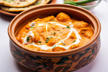 Tasty butter chicken curry or Murg Makhanwala or masala dish from Indian cuisine