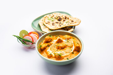 Tasty butter chicken curry or Murg Makhanwala or masala dish from Indian cuisine
