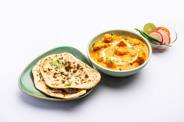 Tasty butter chicken curry or Murg Makhanwala or masala dish from Indian cuisine
