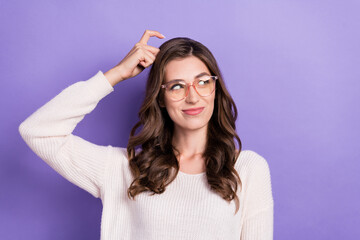 Fototapeta na wymiar Photo of funky gorgeous smart woman scratch head finger unsure choose best deal option look empty space isolated on purple color background