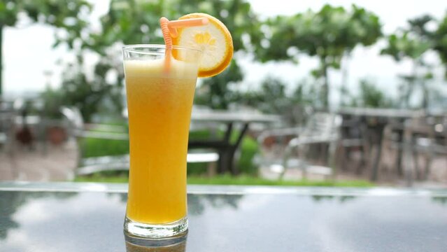 glass of orange juice outdoor 