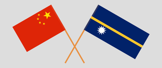 Crossed flags of China and Nauru. Official colors. Correct proportion