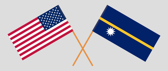 Crossed flags of the USA and Nauru. Official colors. Correct proportion