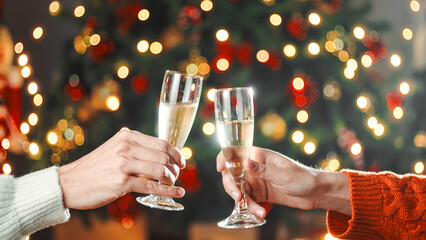 Champagne toast for new year event against the tree
