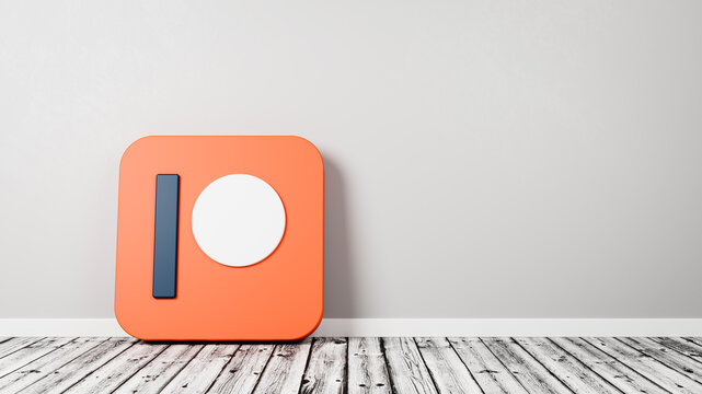 Patreon App Icon on Wooden Floor Against Wall