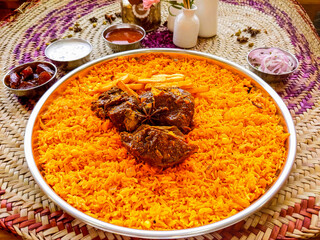 Bukhari Lamb with raita served in dish isolated on table top view of arab food