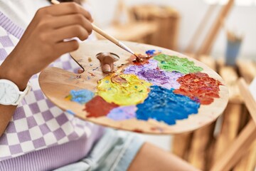 African american girl drawing at art school