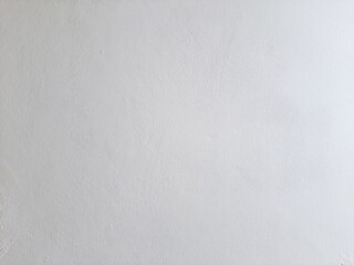 White paint wall texture background with sunlight