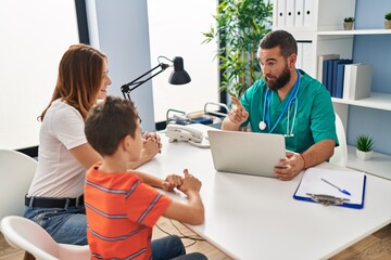 Family having medical consultation at clinic