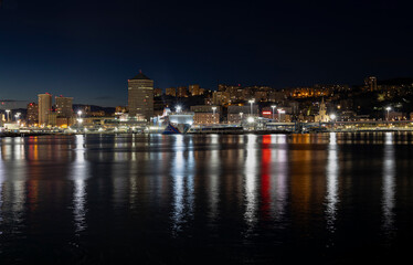 Fototapeta na wymiar GENOA, ITALY, NOVEMBER 20, 2022 - View of Genoa port by night, Italy