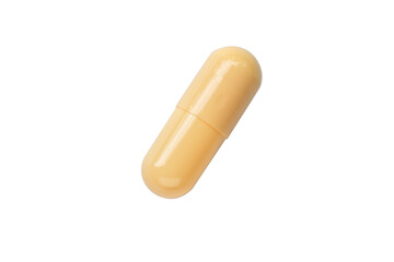 yellow pill capsule isolated on white background