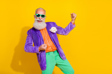 Photo of aged man triumphant raise fist up win millionaire lottery isolated on shine color background