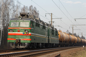 Fototapeta na wymiar Train locomotive on railway tracks