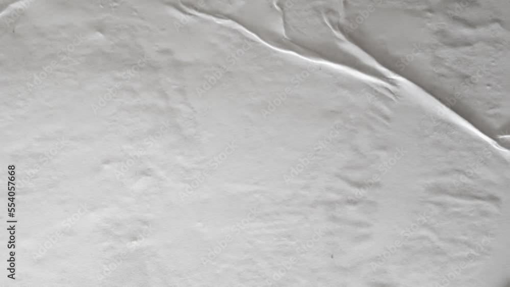 Poster Abstract blank white glued paper texture for video overlay. Matted wet paper for video effect, copy space, intro, background and transition