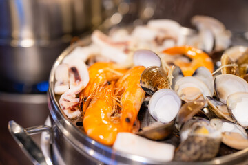 Full of seafood in the steamed bowl at restaurant