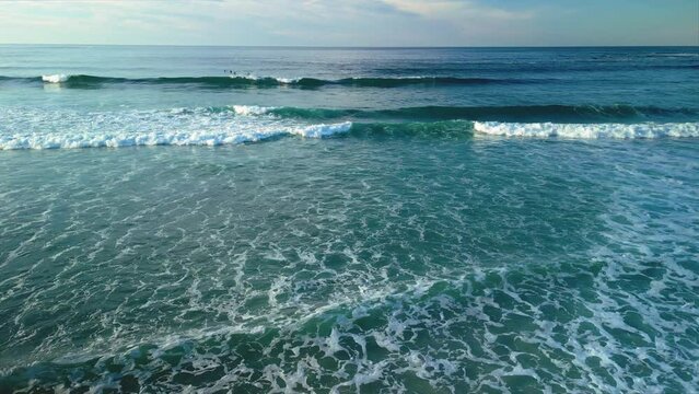 Surfing Waves With Turquoise Water At Praia de Caion In Galicia, Spain. Aerial Wide Shot