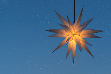 weihnachtlicher Stern mit Schneefall (Herrnhuter Stern)