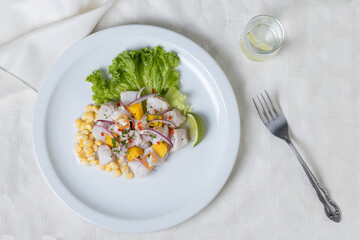 Top view of Ceviche, typical fish-based dish of Peruvian cuisine.