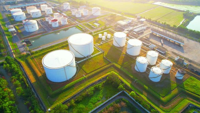 Oil station gasoline tank on the ground in large oil distribution center. oil is a commodity that is exported all over the world. energy and Fossil Fuel concept. energy and fuel for export industry.
