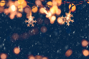Christmas snowflakes lights with falling snow, snowflakes, Winter and new year holidays. copy space.