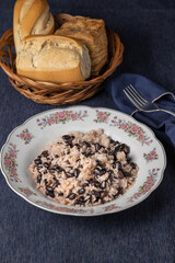 Gallo pinto, traditional Costa Rican food on decorated plate.