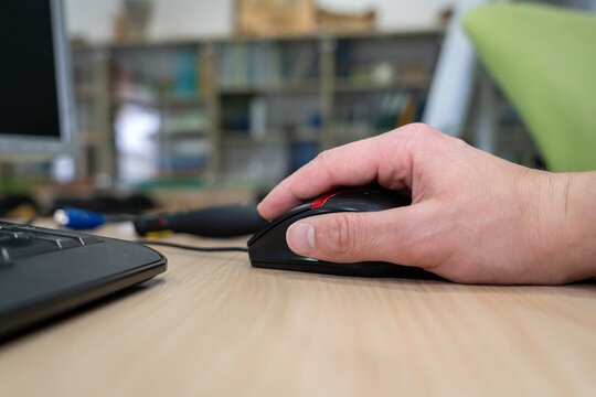 Person Using Computer Mouse