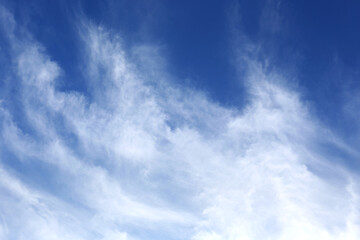 Picturesque blue sky with white clouds on sunny day