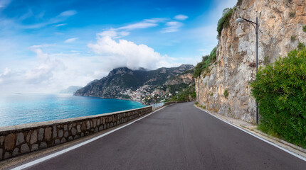 Scenic Road on Rocky Cliffs and Mountain Landscape by the Tyrrhenian Sea. Amalfi Coast, Positano, Italy. Adventure Travel. Cloudy Sky Art Render.