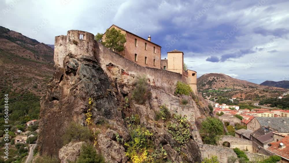 Sticker corsica travel and landmarks. aerial drone video of medieval corte town- mountain village in the cen