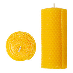 Beeswax pillar candle, isolated from above and front view. Made by pressing natural bees wax between metal rollers, giving the candle the typical honeycomb pattern. Rolled around a cotton candle wick.