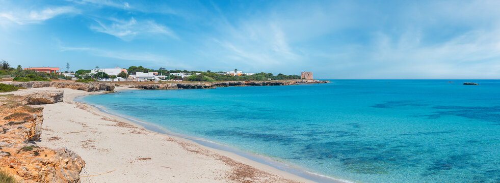 Torre Specchia Ruggeri view from Ionian Sea summer beach (Lecce Region, Puglia, Italy).